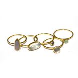 Five 18 carat gold gem set rings