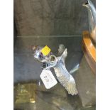 Chrome effect eagle car mascot, the wings outspread clutching a globe 10cm high