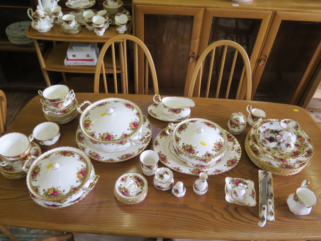 A Royal Albert Old Country Roses pattern dinner and tea service and accessories including teapot and