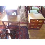 A small reproduction campaign chest, with leather top and three drawers 50cm wide and a brass