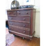 A Victorian mahogany chest of drawers, with two short and three long graduated panelled drawers on a