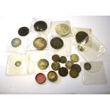 A collection of mixed coins to include hammered coins, etc