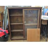 An oak bookcase, with sliding glazed doors, 104cm wide, 109cm high