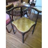 A Victorian walnut nursing chair, with scroll carved open back, moulded cabriole legs and pot