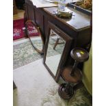 Two oak framed wall mirrors, an oak ship's wheel shaped aneroid barometer and a smoker's stand (4)