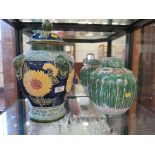 A Chinese ginger jar and cover, in famille verte colours depicting butterflies, 24cm high, and