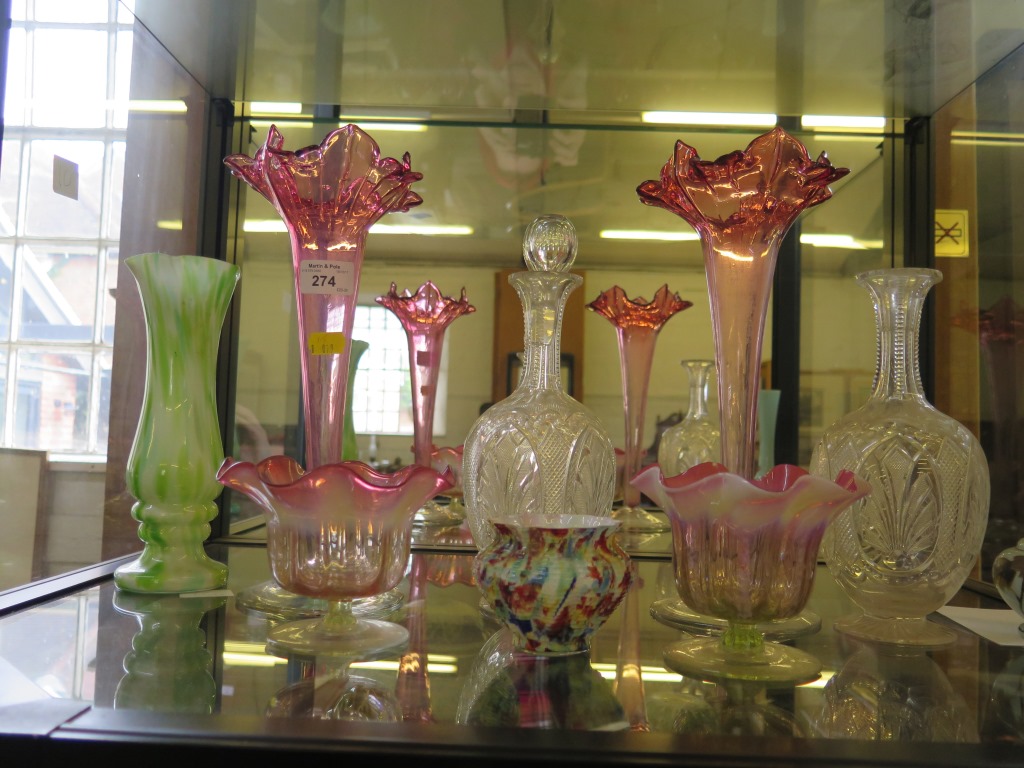 A pair of Cranberry glass spill vases, 32cm high, and other Victorian coloured glass vases and a