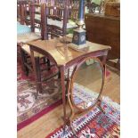 A mahogany oval toilet mirror and a concave sided square occasional table with cross stretcher 49cm