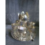 A silver plated egg cup on stand