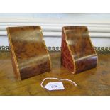 A pair of Edwardian birds-eye maple book ends, 12.5cm