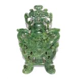 A large jade vase and cover with ring handle on four feet, 30cm high
