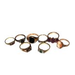 A collection of eight gem set rings mounted in 9 carat gold