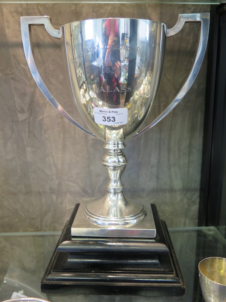 A silver two handled trophy, engraved Royal Yacht Squadron Regatta 1934 'Thalassa', 26cm high, on