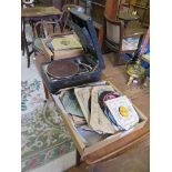An H.M.V. picnic gramophone, and a collection of records, as found