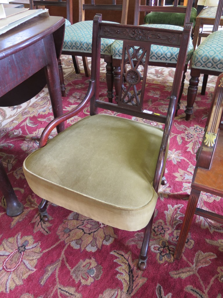 A pair of Edwardian mahogany bedroom chairs, with floral carved rectangular backs and sabre legs - Image 2 of 2