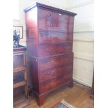 A George III mahogany chest on chest, the dentil cornice over two short and three long graduated