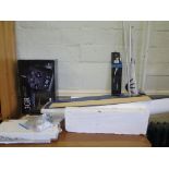 A model fibreglass racing yacht, part complete, hull 100cm long, and a Futaba 3ER RC controller