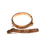 A 9 carat rose gold gate bracelet together with a chased 9 carat gold bangle (some dents) 24 grams
