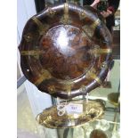 A papier-mache faux-walnut wavy-rim dish with brass mounts, 25.5cm