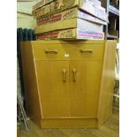 An oak G-Plan corner secretaire, with fall front drawer and a pair of cupboard doors, 98cm wide,