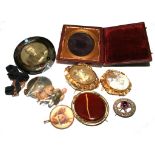 Three gold plated frames, a double locket, a ladies 1920's gold watch, a cased photo frame, etc
