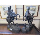 A pair of spelter Marly horses 32cm high