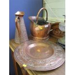 A Joseph Sankey bubble effect six pint copper jug 34cm high, a copper charger 45cm diameter and a