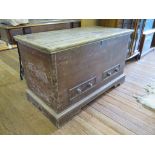 A painted pine chest, the hinged lid over two false drawers on bracket feet, 109cm wide