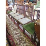 A set of four oak dining chairs, the reeded railbacks on similar square section legs, and a pair