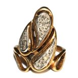 An 18 carat gold dress ring with diamond set leaves