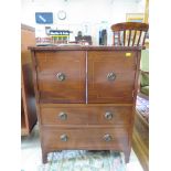 A George III style mahogany and boxwood strung cabinet, the twin doors over two drawers on bracket