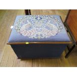 An early Victorian rosewood and blue upholstered blanket box, the hinged lid with tapestry seat 63cm