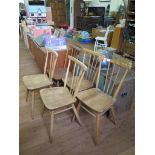 A set of five Ercol beech and elm kitchen chairs