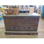 A painted pine chest, the hinged lid over two false drawers on bracket feet, 109cm wide