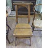 An oak metamorphic library steps chair