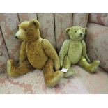 Two plush teddy bears, with bead eyes and stitched noses, 39cm and 32cm long