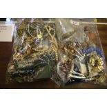 Two large bags of mixed costume jewellery