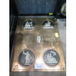 A late Victorian brass and cameo mounted letter folio, depicting Classical scenes, 28.5cm x 23cm
