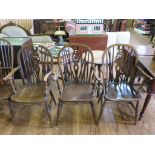 Three 20th century ash and elm wheel back Windsor armchairs