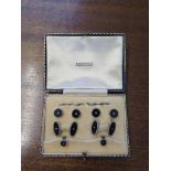 A cased set of dress studs and cufflinks from Austin Reed