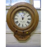 A pine framed wall clock, the dial inscribed William Stinton - Sherston, quartz movement, 56 cm