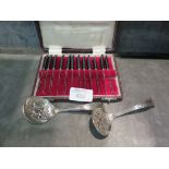 A cased set of twelve vintage pickle forks, Elizabeth R 1953, together with a small pair of silver