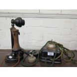 A 1930s stick telephone and another telephone of the same period (2)