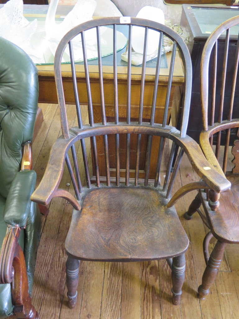 A 19th century ash and elm comb back Windsor chair with H stretcher