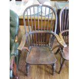 A 19th century ash and elm comb back Windsor chair with H stretcher