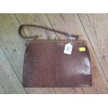 A Mappin and Webb brown snakeskin handbag 26cm wide