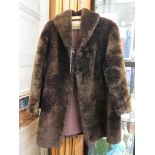 A faux fur coat by Marcus