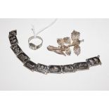 A silver and niello decorated bracelet of ten plaques, a matching ring, etc