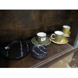 A set of six Susie Cooper Carnaby Daisy pattern coffee cans and saucers and a set of six other small