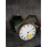 A brass circular table clock, the enamel dial inscribed George Blackie, Strand, the single train